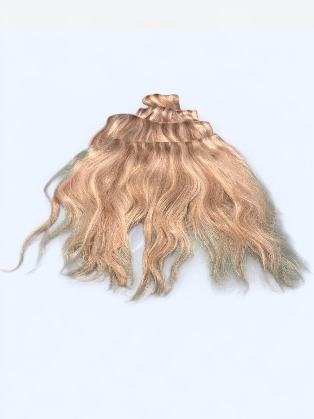 Blonde Wavy Clip-In Extensions with Subtle Ombré Effect